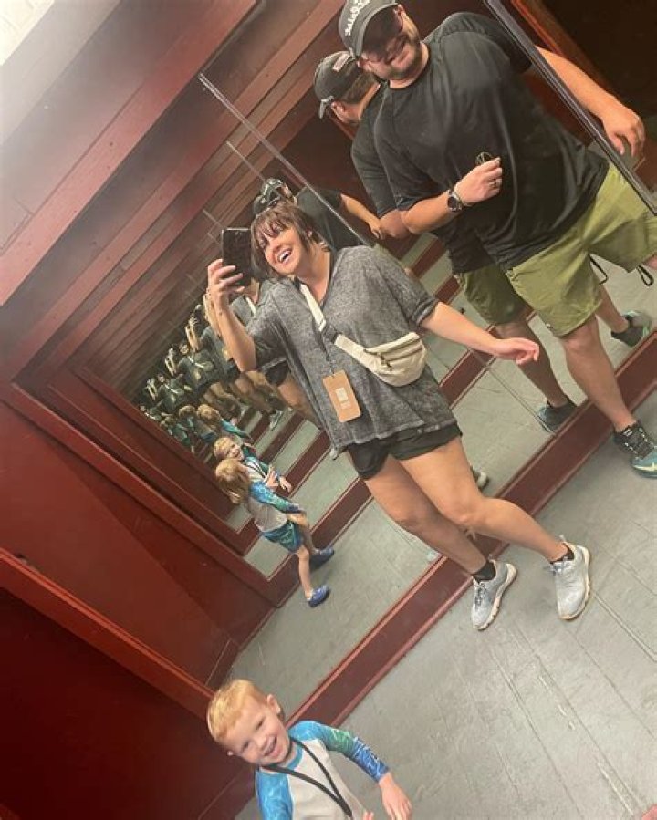 Amy Duggar defies family's strict dress code as she shows off curves in short shorts on amusement park trip