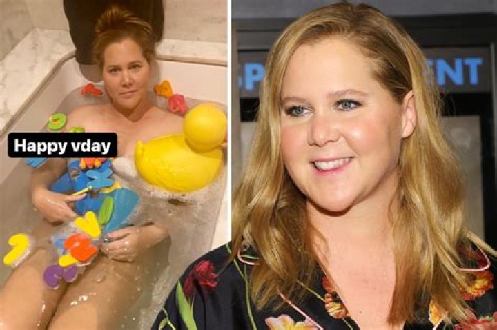 Amy Schumer goes nude in the bathtub & declares she's a 'boss a** b***h' after she's announced as the new Oscars host