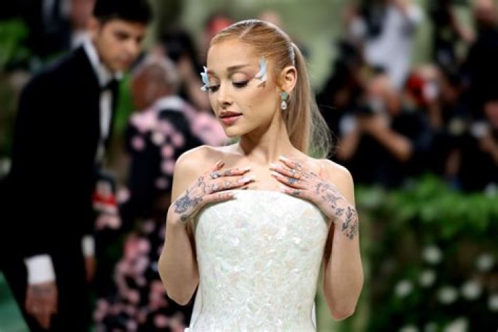 Ariana Grande Covered Up Arm Tattoos for Wedding Photos 