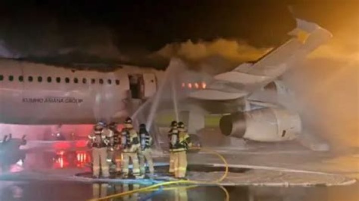 Horror moment passengers see flames coming from their plane as it catches fire on landing at Atlanta airport