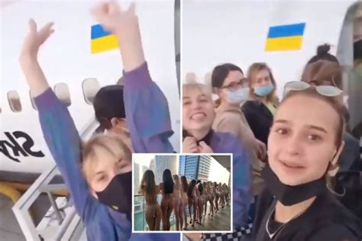 ‘Butt Squad' models wave on plane leaving Dubai & are BANNED from returning for five years over their naked balcony snap