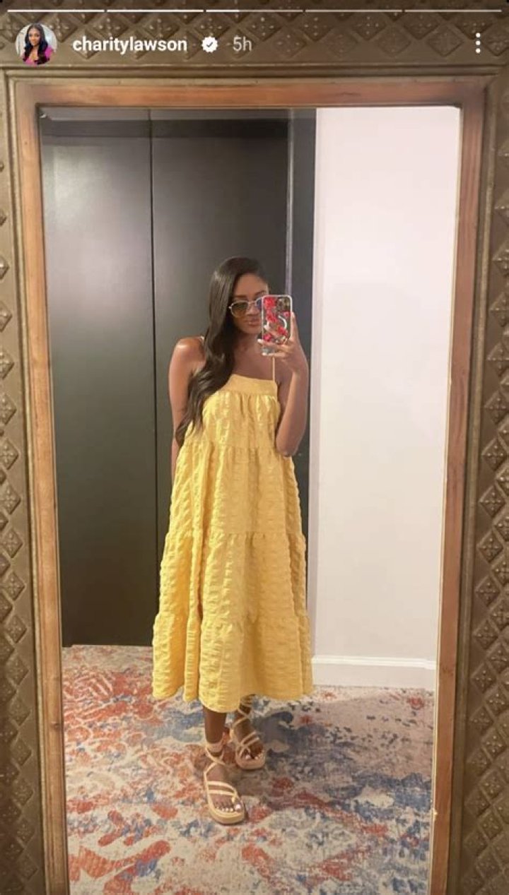 Charity Lawson Looks Bright and Sunny in a Tiered Yellow Dress