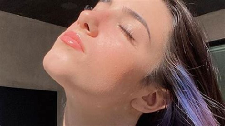 Charli D’Amelio’s Hair Stylist On Peek-A-Boo 50/50 Hair