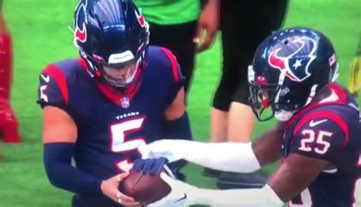 NFL fans baffled as 'cheating' Houston Texans appear to GLUE glove to ball during game