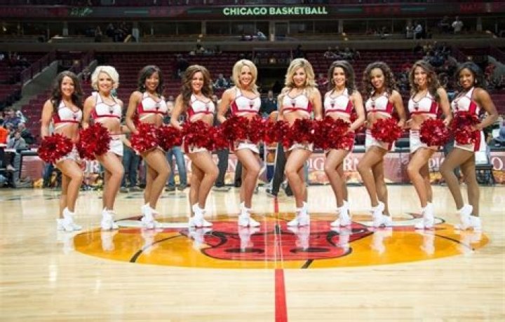 My mom was a Chicago Bulls cheerleader in 1995 - I tried on her old uniforms and gear, people love my ‘drip’
