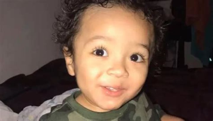 Chilling details emerge after toddler's body dumped in shallow grave 60 miles away as cops urgently hunt for killer