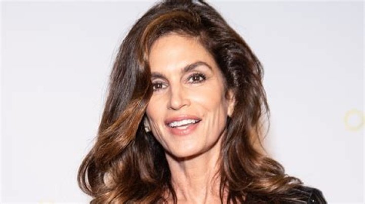Cindy Crawford, 55, shows off legs in tiny shorts as she recreates iconic Pepsi ad to raise money for cancer charity