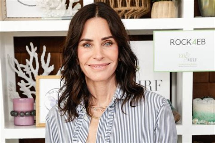 Courteney Cox Wears Purple Bikini for Cold Plunge Session