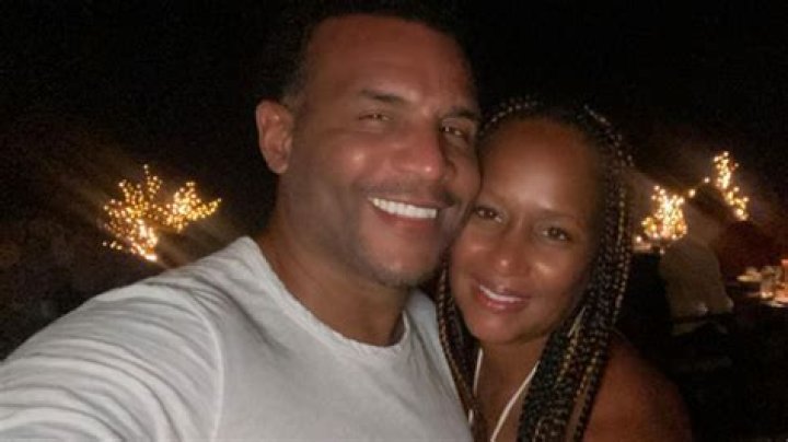 Who is David A Arnold's wife Julie Harkness?