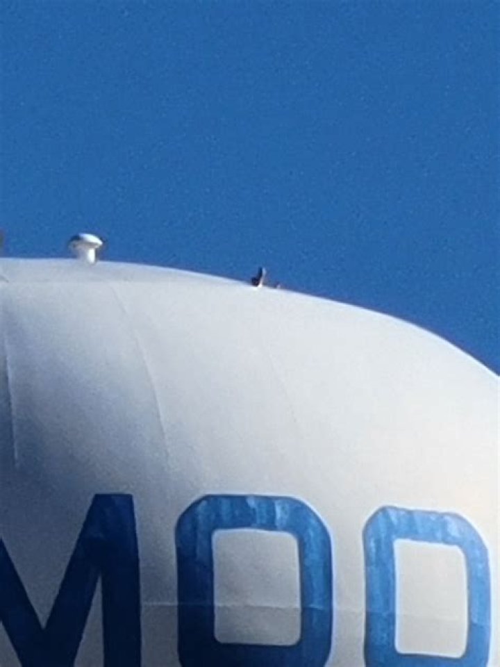 Drones dropping adult toys on rooftops and traffic lights in Oklahoma City spark chaos as cops hunt suspect behind prank