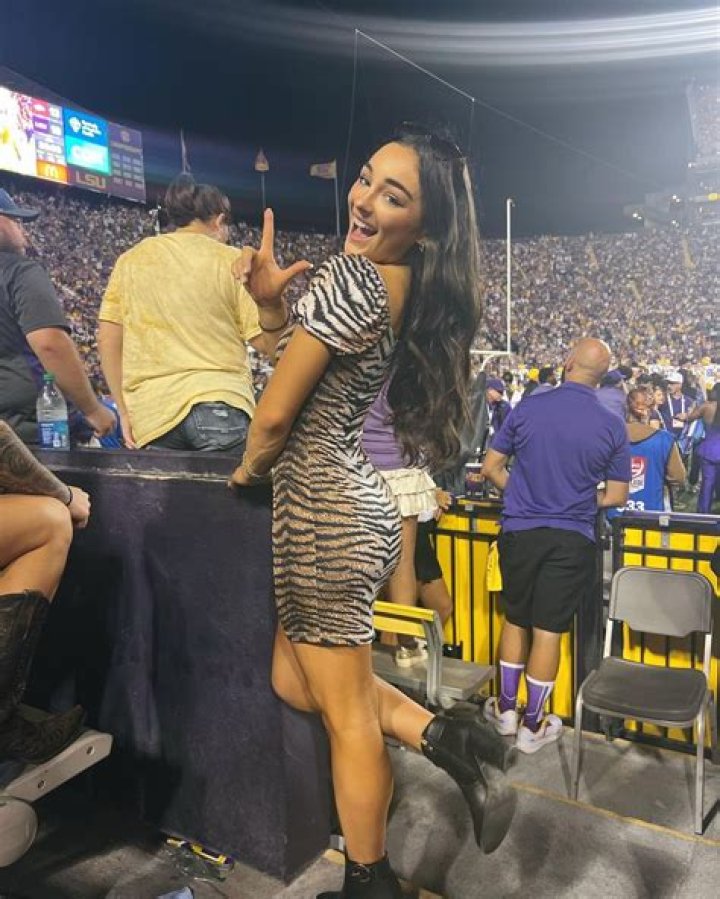 Gymnast Elena Arenas whose pics ‘should be illegal’ stuns in beach bikini snaps as LSU star 'goes back to summer'