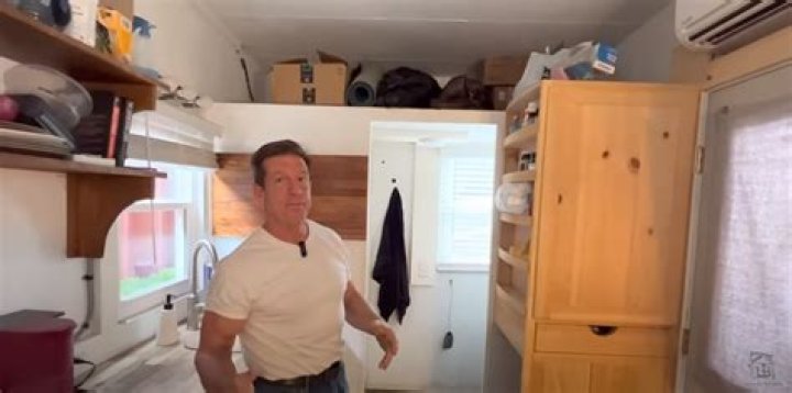 Meet the 'Elon Musk of the tiny home movement' who lives in a $20,000 pint-sized abode that's only 8ft wide