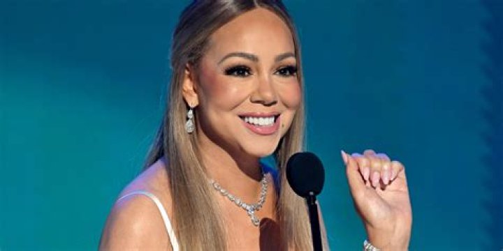 Eminem Threatens to Release Racy Pics of Mariah Carey