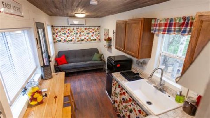 Inside a unique tiny home village starting at $99 a night - you have sizing options and your money goes to a good cause