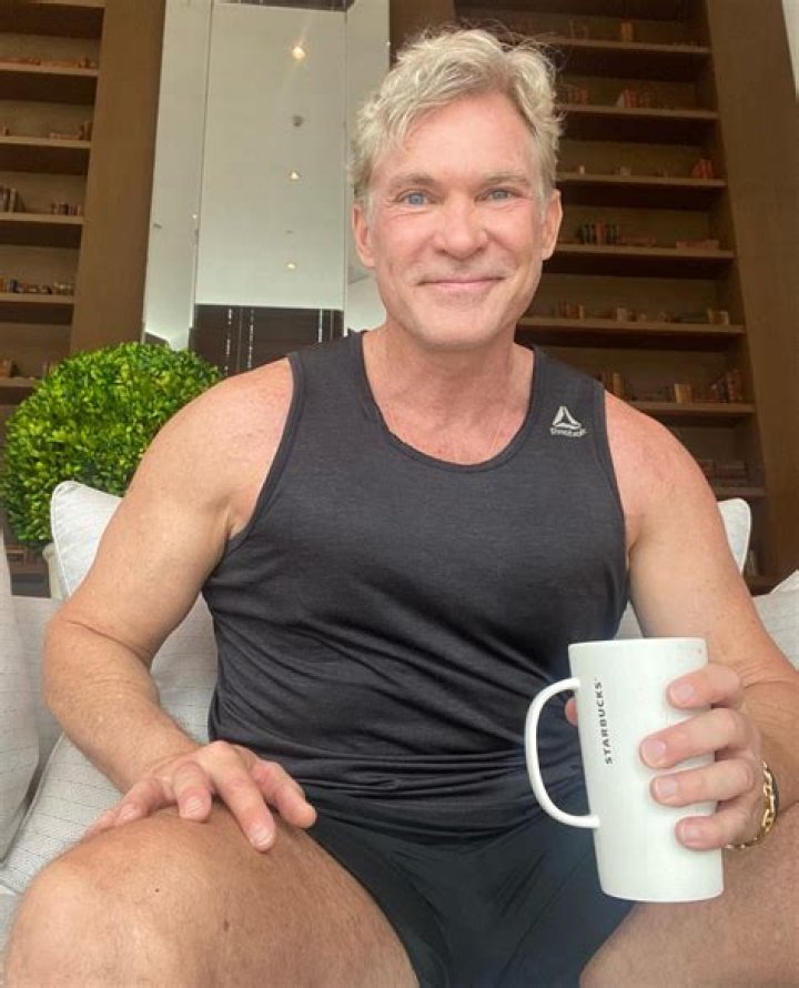 GMA’s Sam Champion shows off his toned body as he goes shirtless in new video from Miami