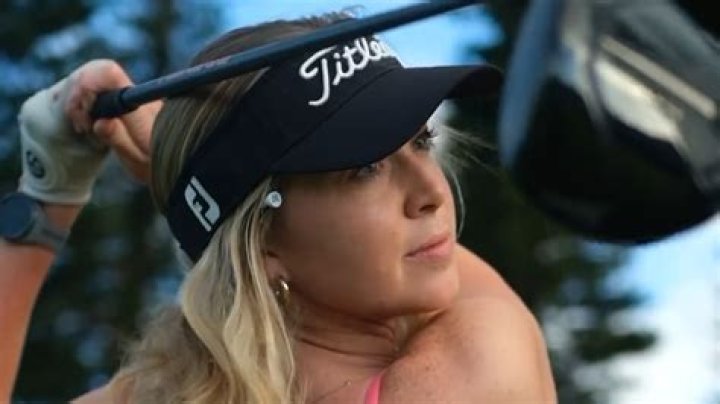 Grace Charis goes braless and narrowly avoids wardrobe malfunction on course as golf star's fans say 'you look amazing'