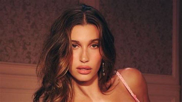 Hailey Bieber flaunts her toned figure in see-through lingerie for new Victoria’s Secret holiday photos