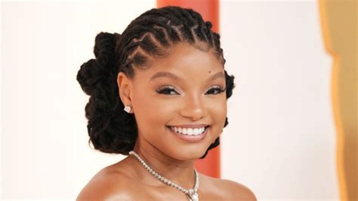 Halle Bailey's XXL Ponytail Makes Her Look Five Inches Taller Than She Actually Is