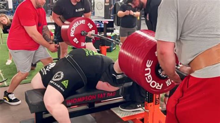 Who holds the heaviest bench press world record?