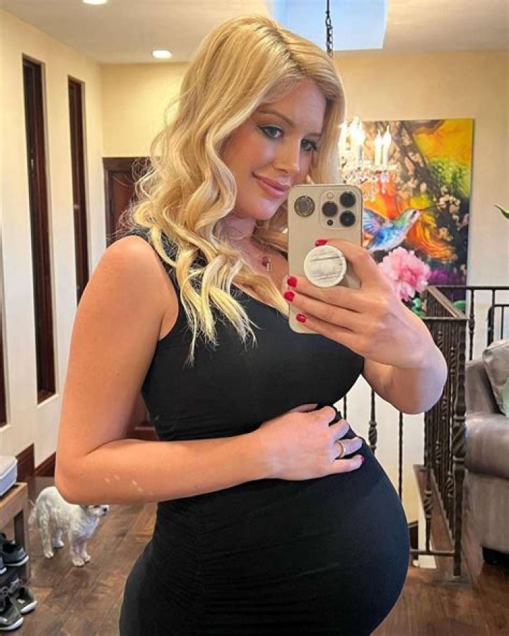 Heidi Montag Caresses Pregnant Sister Holly's Belly in Bikini: Pics