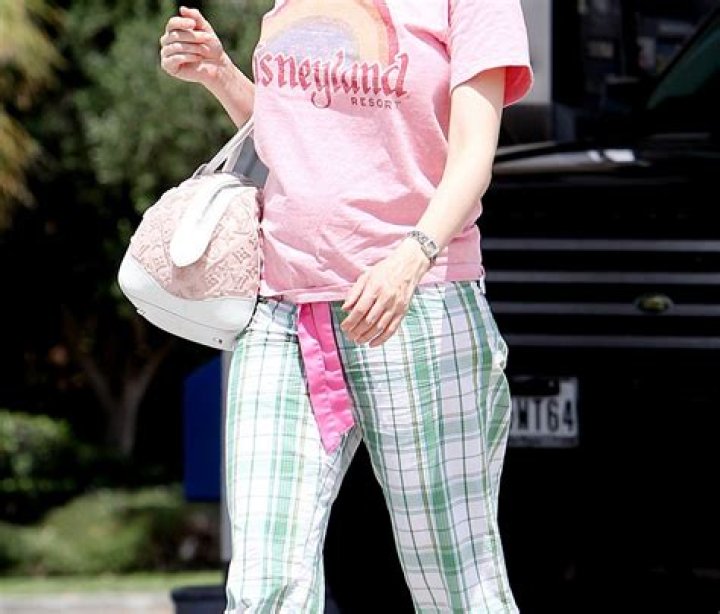 Holly Madison Debuts Tiny Baby Bump in Disneyland Tee