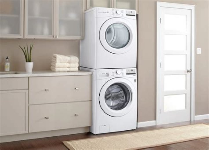 How do I reset my GE stackable washer and dryer?