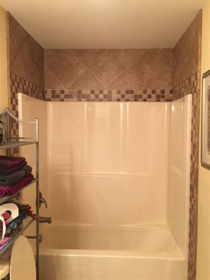 Quick Answer: How Do You Tile Over A Shower Surround