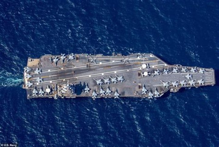 Quick Answer: How Much Doe Each Link Weight Air Craft Carrier