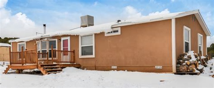 How much does it cost to stucco a mobile home?