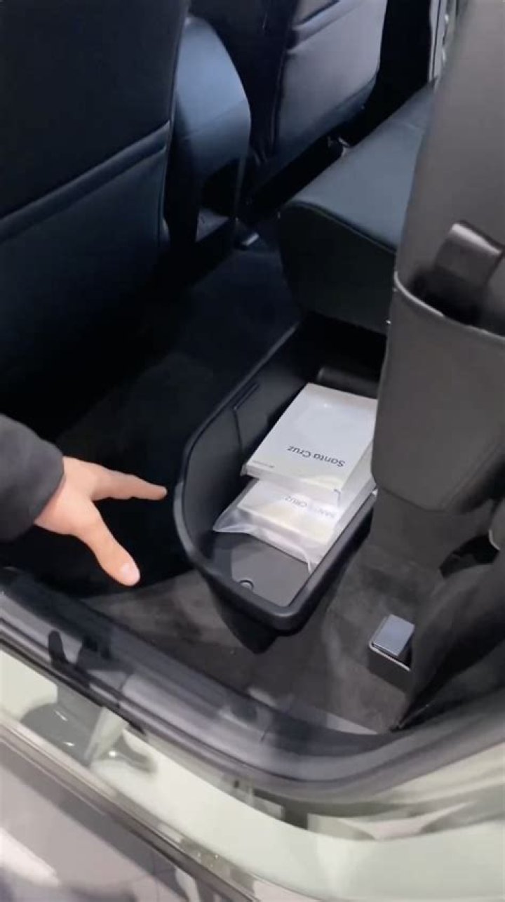 Drivers just realizing they have hidden storage compartments under seats and in their trunks - including an outlet