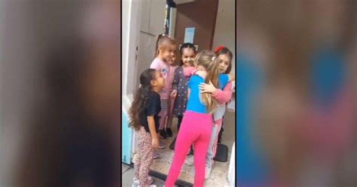 Israeli girl Emilia Aloni hugged by classmates after Hamas kidnap ordeal