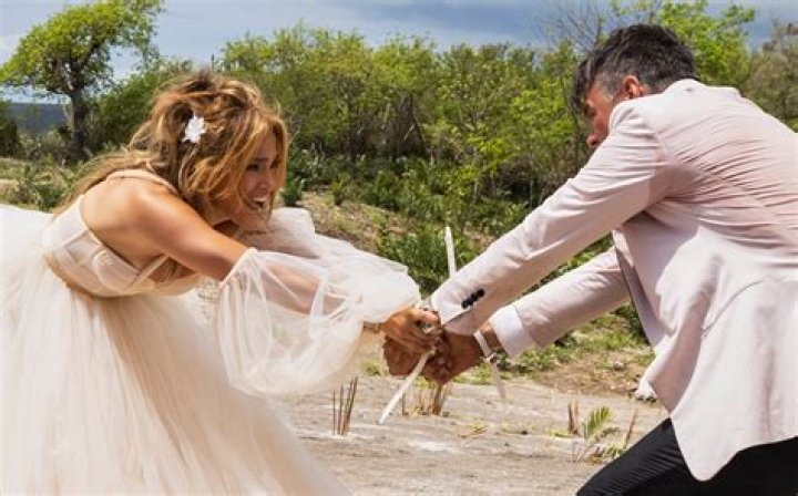 JLo cuddles up to Shotgun Wedding costars Josh Duhamel & Lenny Kravitz in new pics after split from ARod