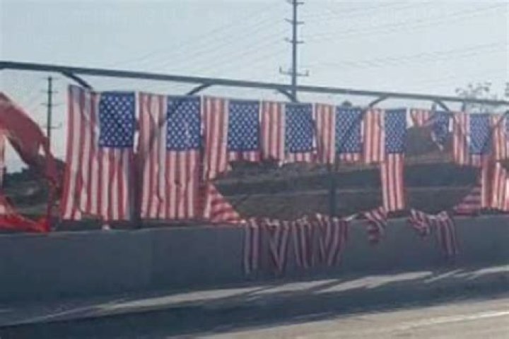 Memorial for 13 troops killed in Kabul keeps getting vandalized as US flags ripped apart are destroyed AGAIN