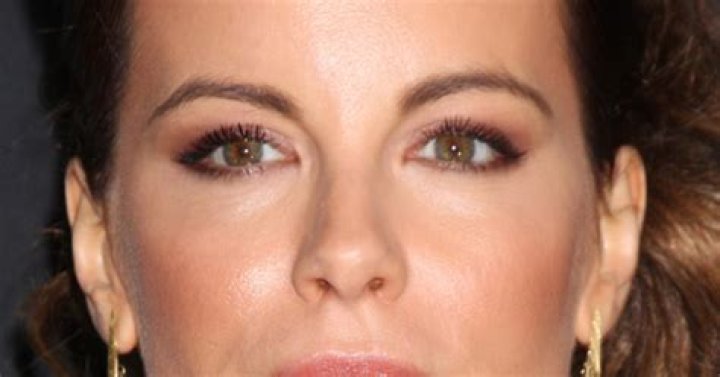 Kate Beckinsale hospitalized two months after stepfather dies, shares tearful photos from bed