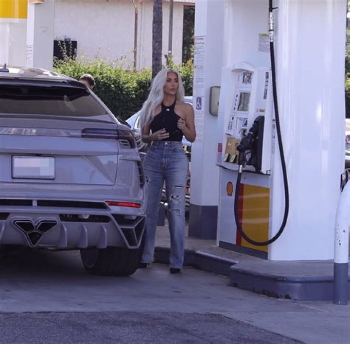 Kim Kardashian fills up her $600K Lamborghini Urus at the gas station- before stopping for snack at McDonald’s
