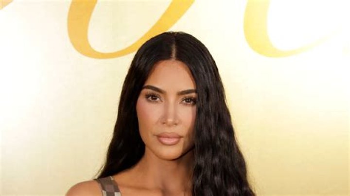 Kardashian fans divided after Kim gives son Saint, 7, gold teeth & huge diamond name necklace in over-the-top new photo