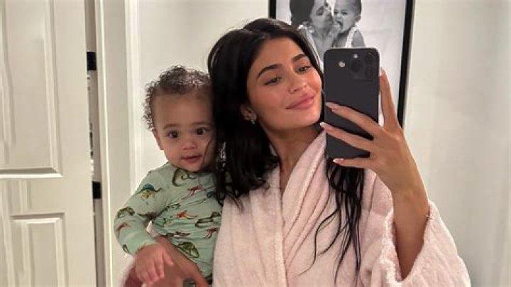 Kylie Jenner's fans think she looks like son Aire's twin in mom Kris' throwback video for makeup mogul's 26th birthday