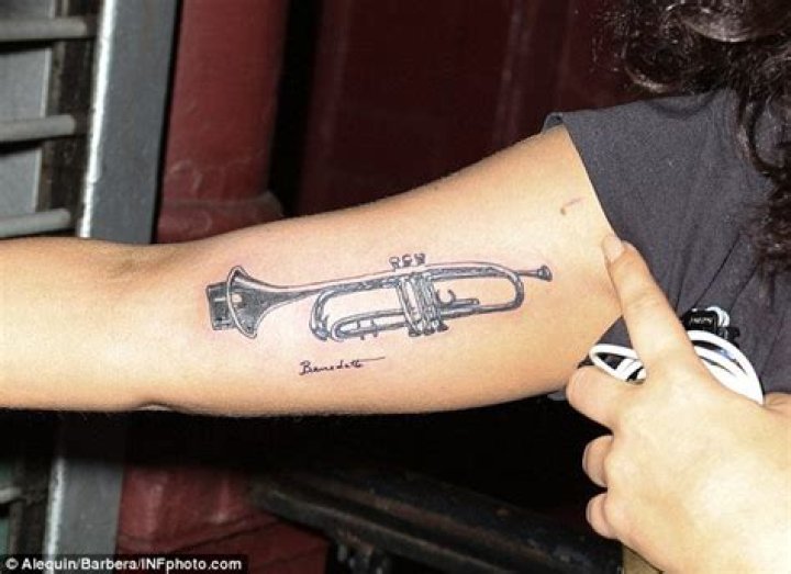 Lady Gaga Trumpet Tattoo Latest News, Photos and Videos
