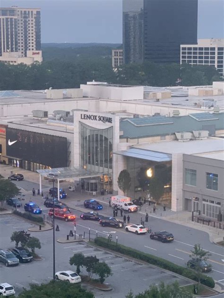 Lenox Square mall shooting - Two arrested after 'security guard shot in front of Atlanta Apple store'