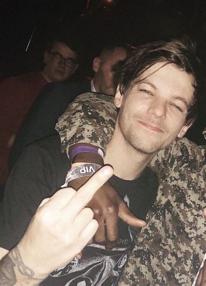 Unraveling The Mystery Behind Louis Tomlinson's Middle Finger Moment