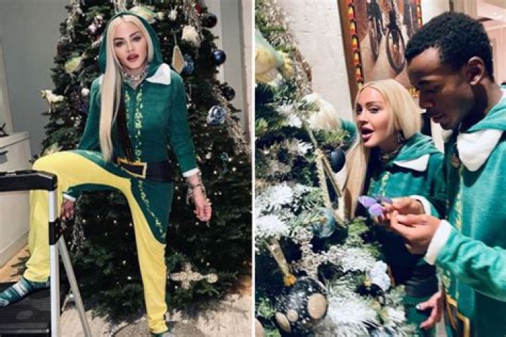 Madonna, 63, dresses up as an elf as she decorates Xmas tree with kids at LA home