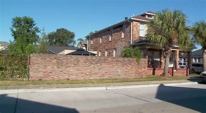 Mystery of man found dead in swimming pool as heartbroken family seen outside of home