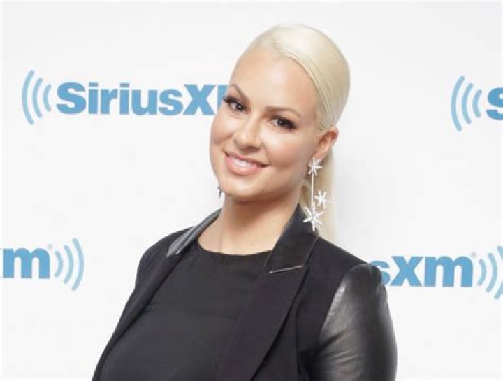 Maryse Drops Very Cheeky Bikini Beach Photo