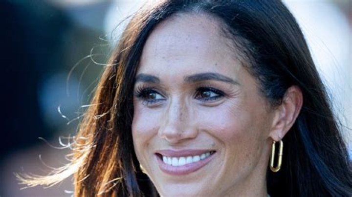 How Meghan Markle’s necklace stacks & messy hair show she’s ditched ‘royal uniform’ - unlike ‘formal’ Kate Middleton