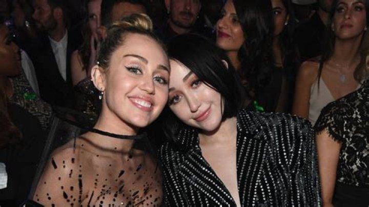 Miley Cyrus' sister Noah looks unecognizable with bleached brows and bizarre outfit in new pics in Paris