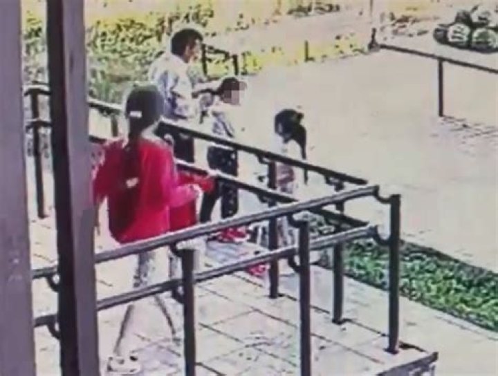 Chilling moment ice-cold ‘paedo’ abducts girl, 6, from outside flats before dad catches him in the nick of time