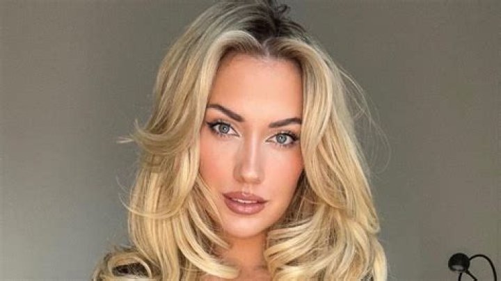 Paige Spiranac lies topless in bed as she is named in 2023 Maxim Hot 100 list after losing world's sexiest woman crown