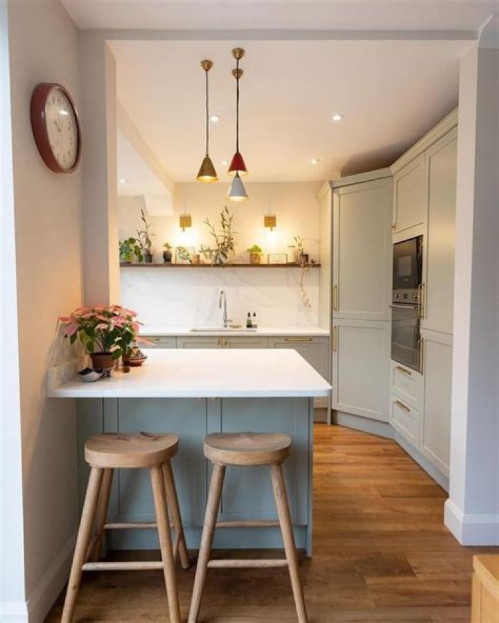 I upgraded my tiny New York kitchen with stick on tiles - they're renter friendly and cost less than $100