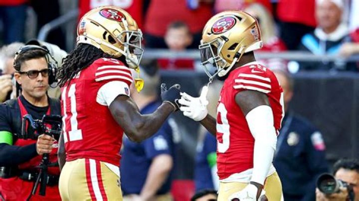 San Francisco 49ers star Brandon Aiyuk makes 'insane' catch off Lions' rivals helmet leaving live TV viewers stunned