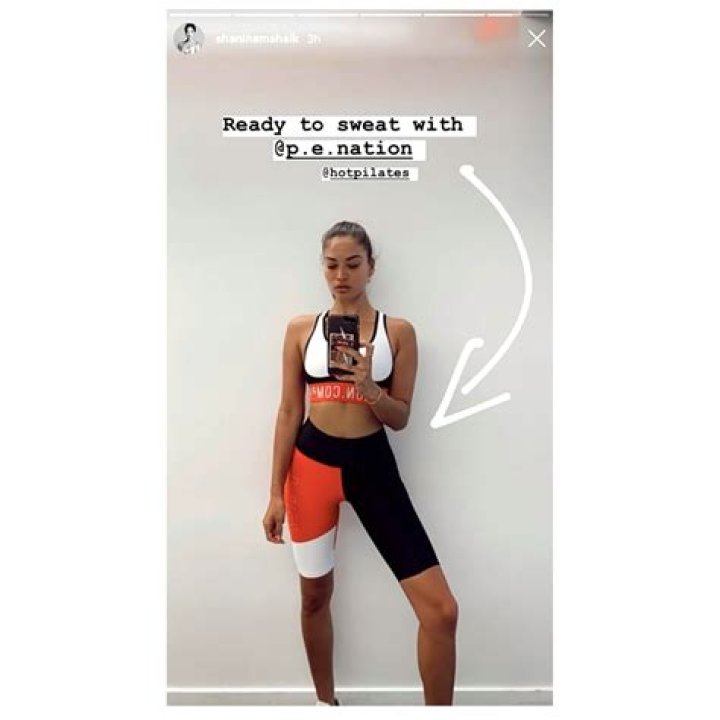Shanina Shaik Stunned in Biker Shorts and Sports Bra for a Hot Pilates Workout